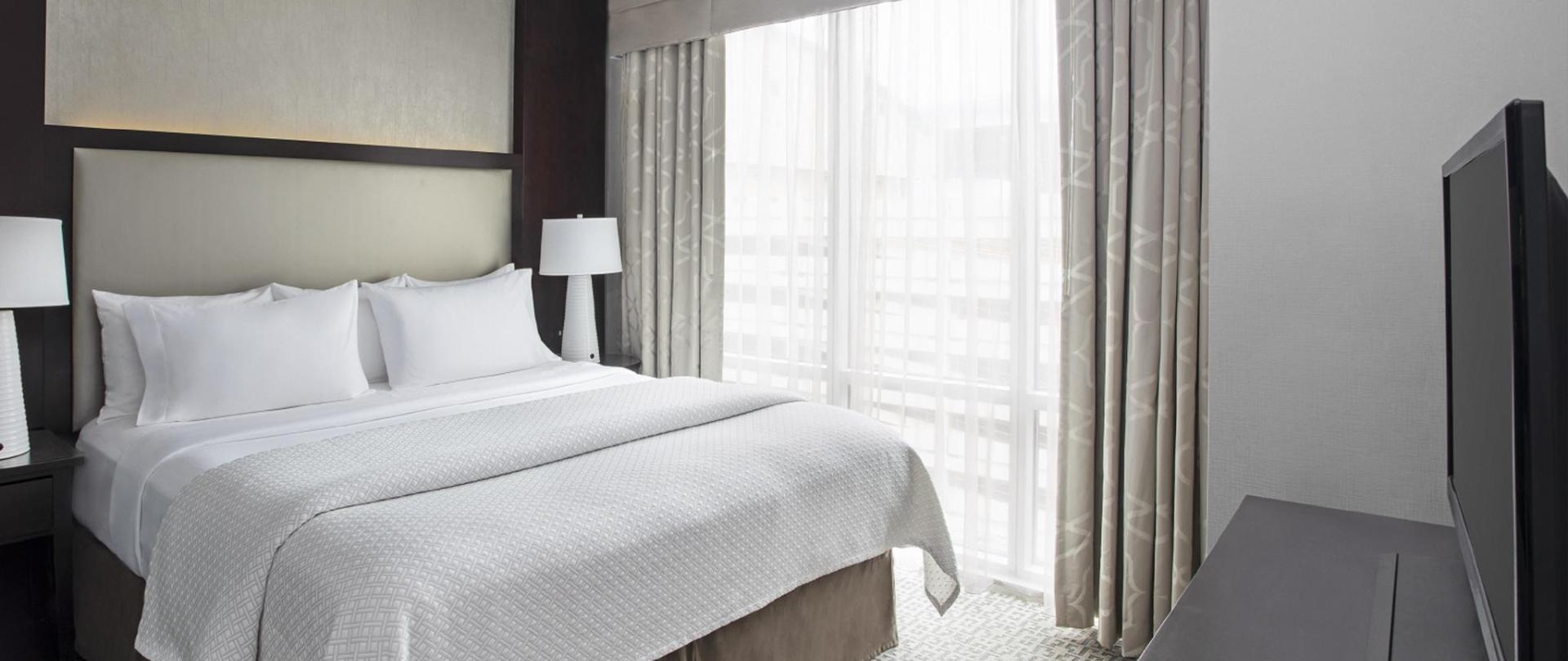 Cambria_WhitePlains_KingBed.jpg